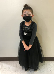 A student dressed for the Day of the Dead